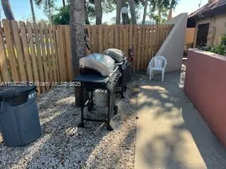 a view of a building with sitting area