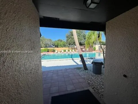 a view of an outdoor space and tennis court