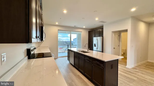 a large spacious bathroom with a large tub and sink