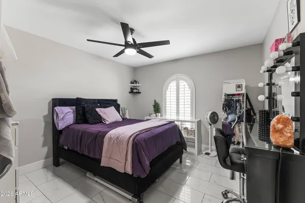 a bathroom with a shower sink and mirror