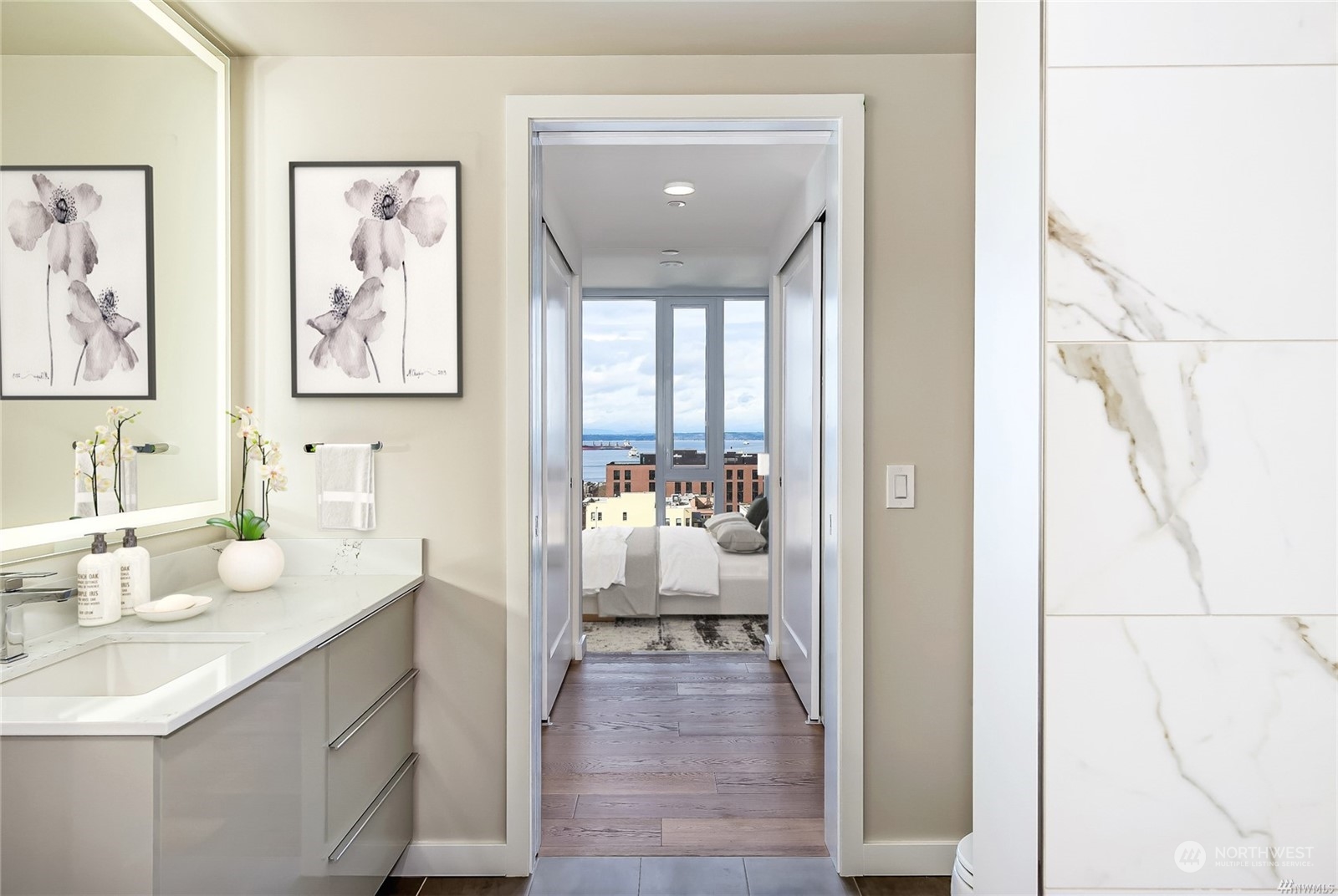 450 South Main Street, Unit 1110 Seattle, WA 98104 - Photo 6 of 24 a bathroom with a sink and a mirror