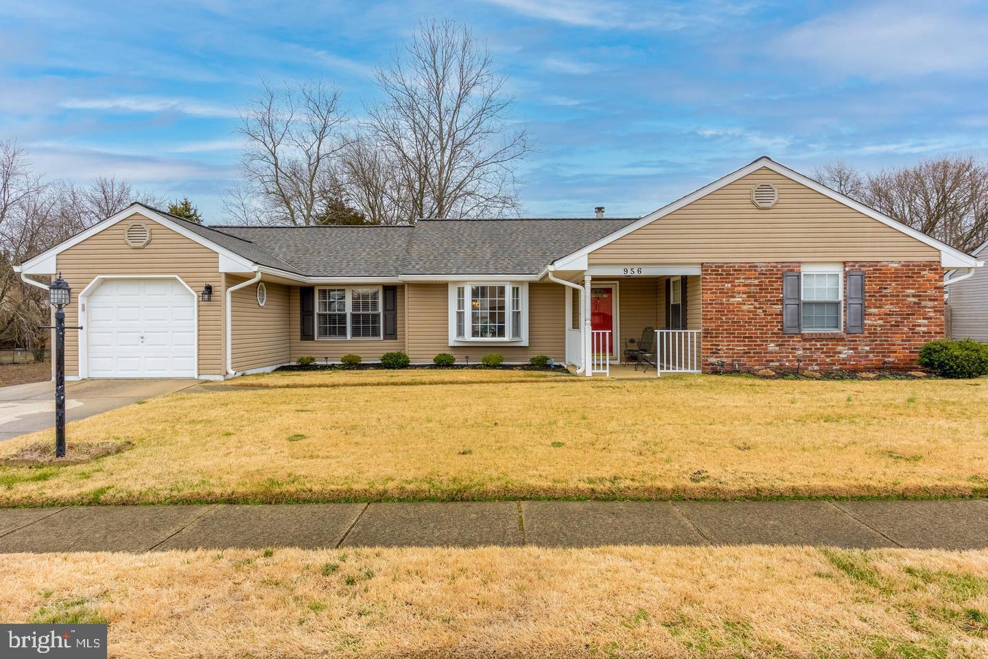 a front view of a house with swimming pool