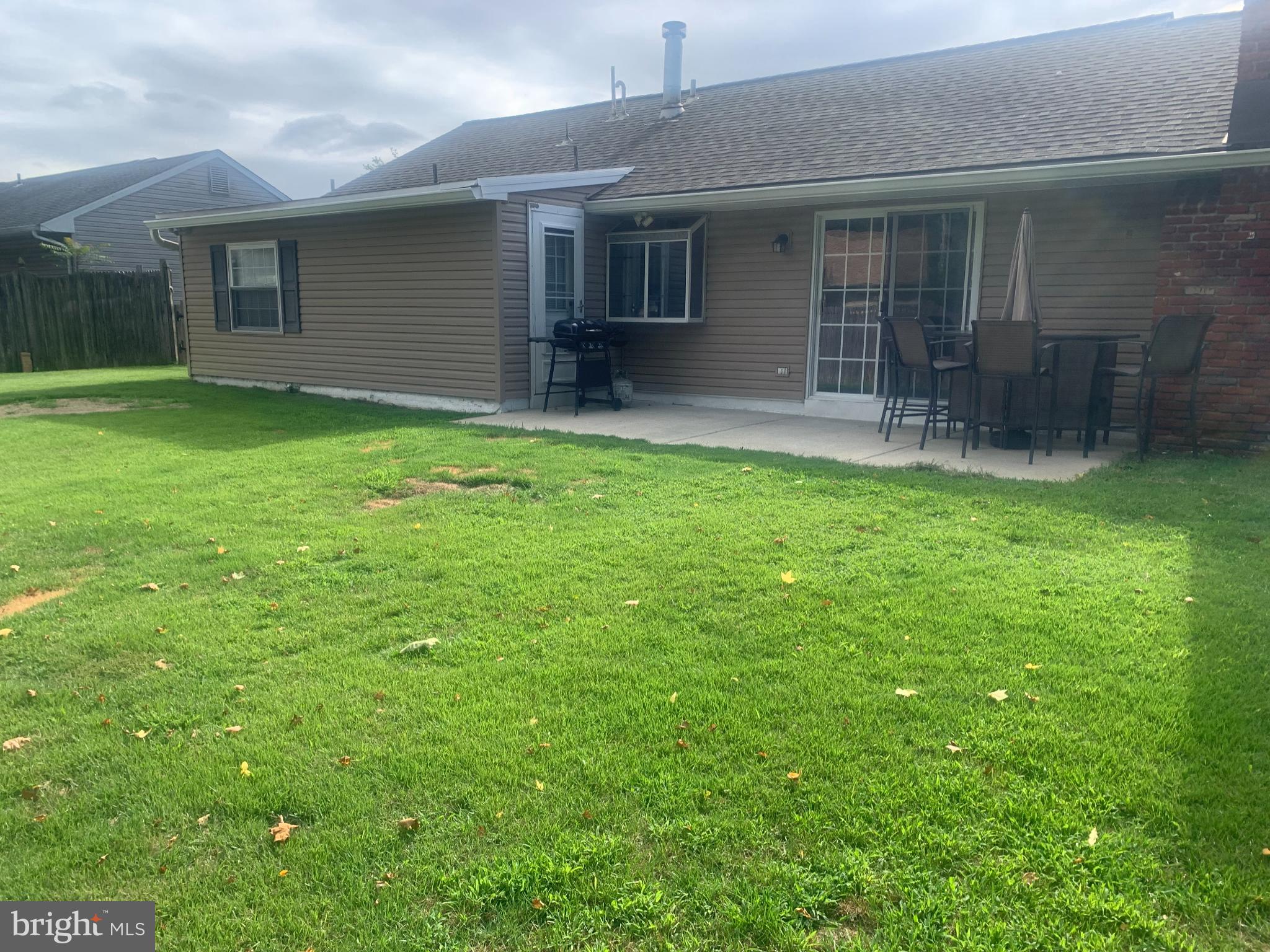 956 North Beecham Road Williamstown, NJ 08094 - Photo 2 of 17 a backyard of a house with yard and barbeque oven