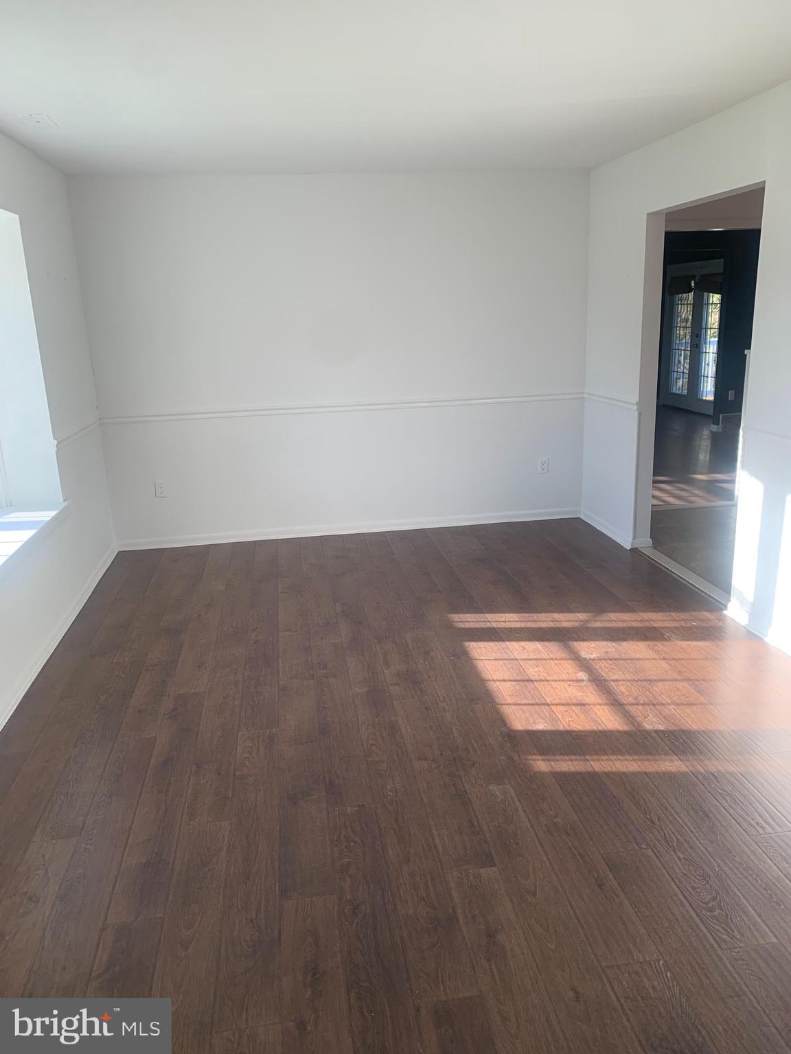 956 North Beecham Road Williamstown, NJ 08094 - Photo 5 of 17 a view of empty room with wooden floor