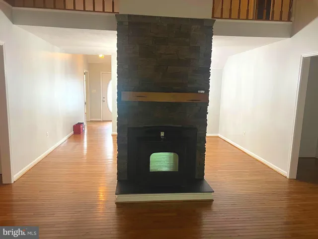 a hallway with wooden floor
