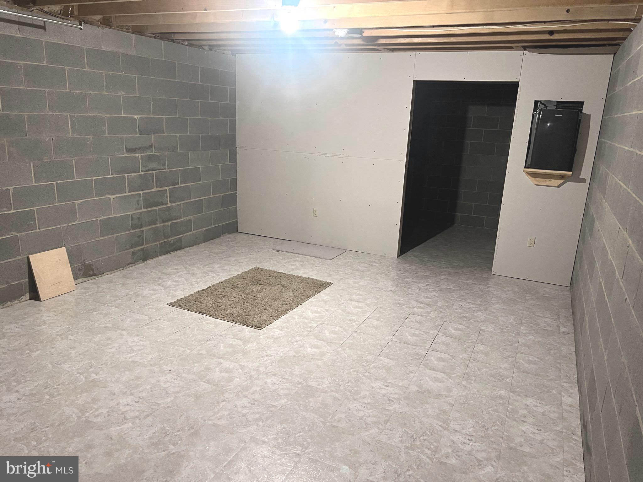 7270 Mackall Road St. Leonard, MD 20685 - Photo 34 of 48 Unfinished basement - lots of storage space