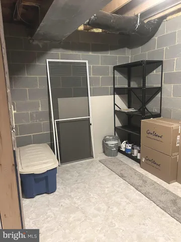 an aerial view of a house with yard