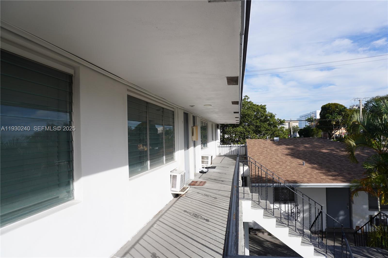 749 Southeast 15th Street, Unit 8 Fort Lauderdale, FL 33316 - Photo 15 of 15 a view of a house with backyard and sitting area