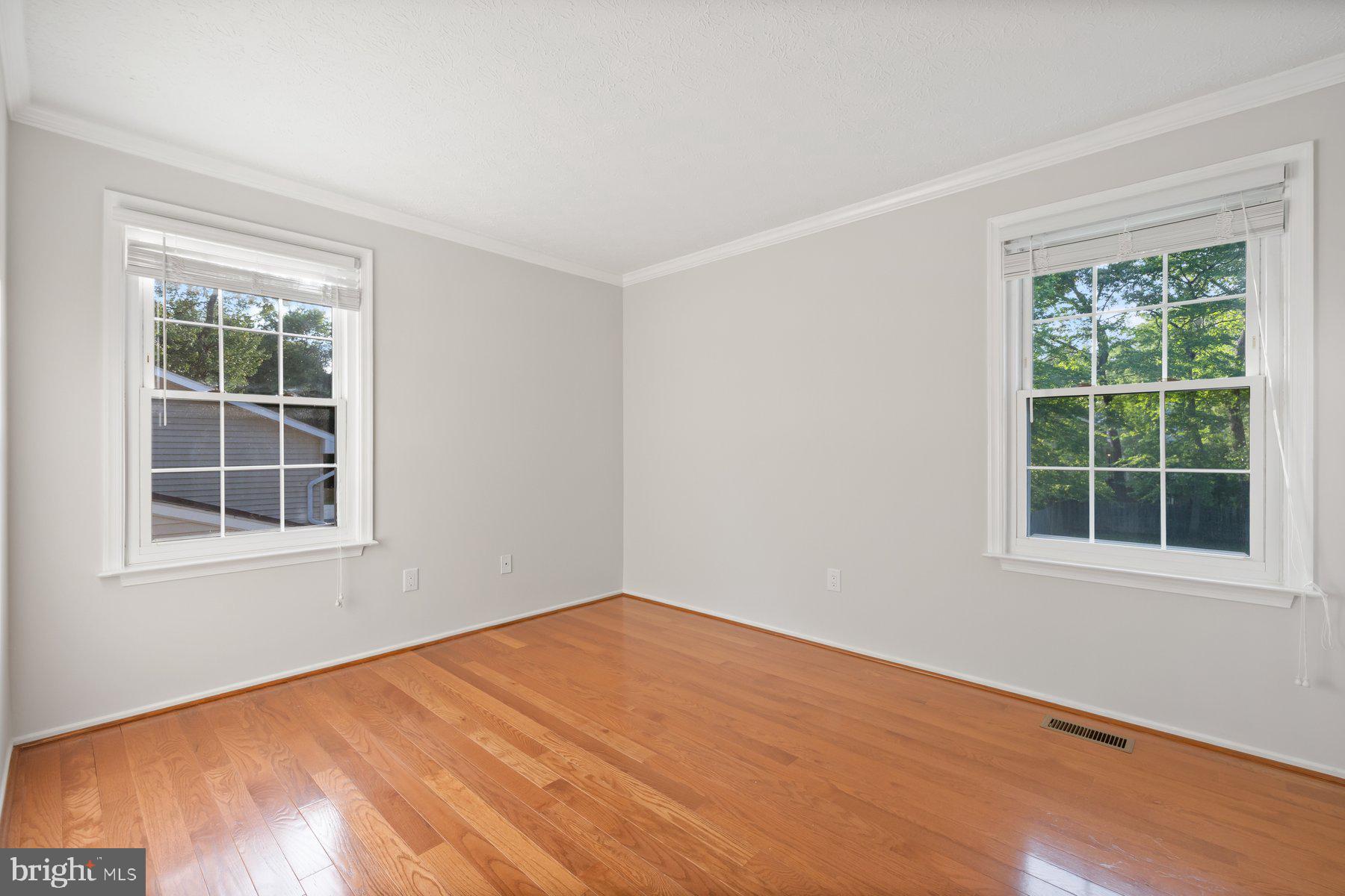 8304 Grainfield Road Severn, MD 21144 - Photo 12 of 49 an empty room with a window