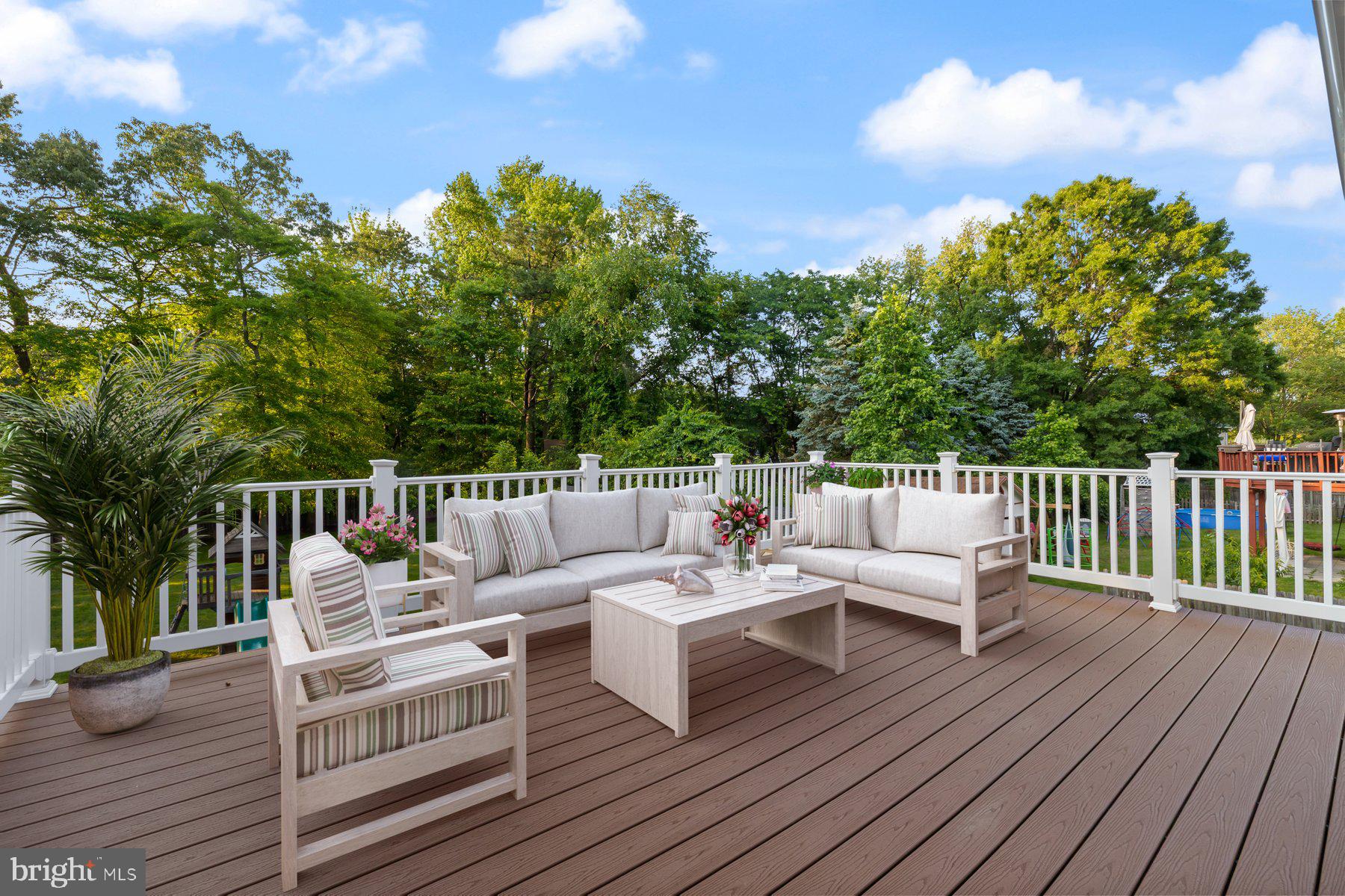 8304 Grainfield Road Severn, MD 21144 - Photo 29 of 49 a balcony with wooden floor and fence