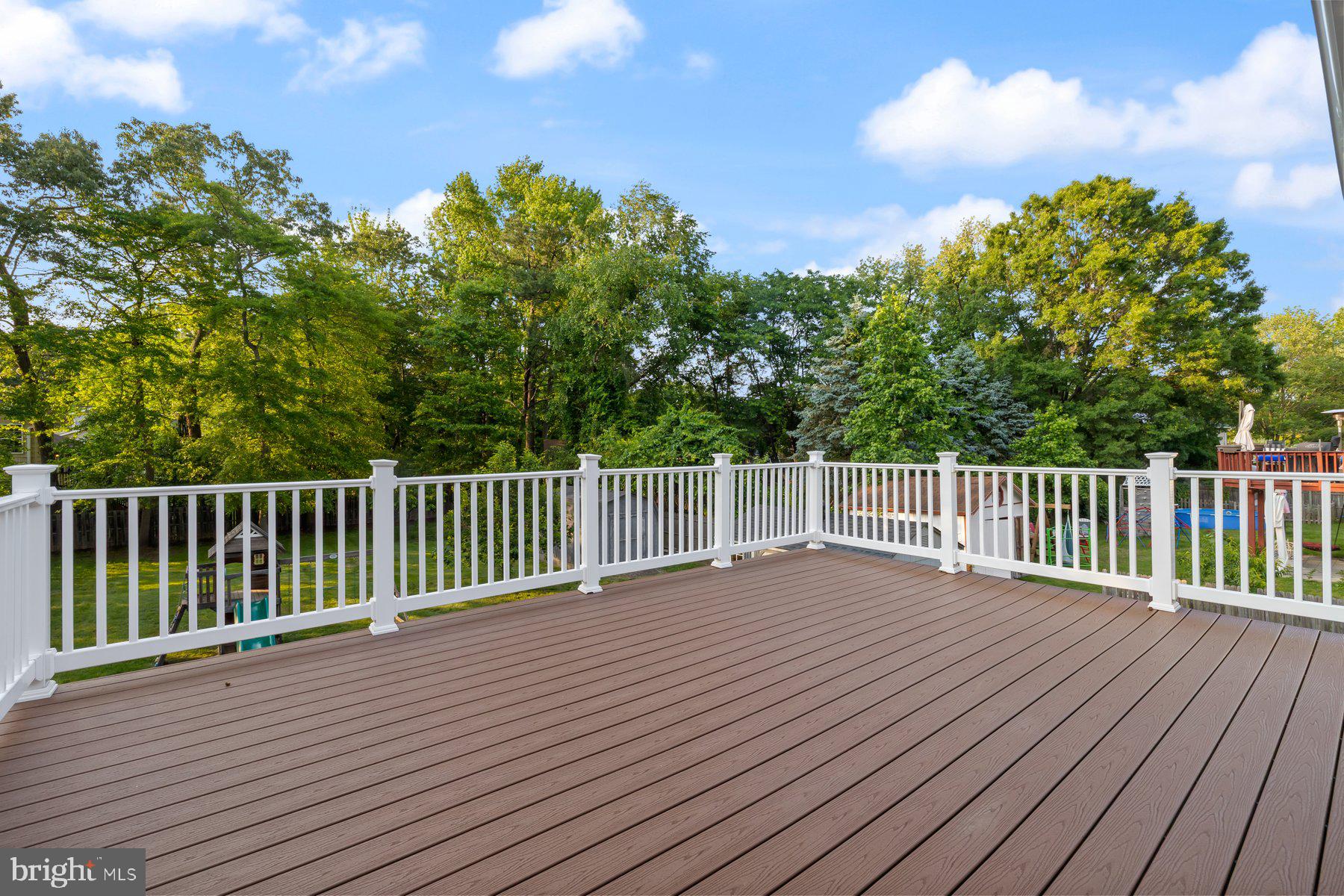 8304 Grainfield Road Severn, MD 21144 - Photo 30 of 49 a view of a wooden deck