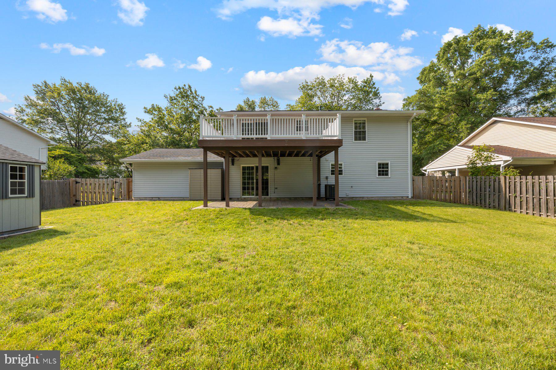 8304 Grainfield Road Severn, MD 21144 - Photo 31 of 49 a house view with swimming pool in front of it