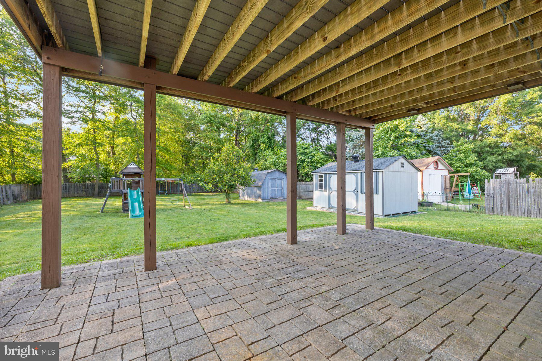 8304 Grainfield Road Severn, MD 21144 - Photo 32 of 49 a view of porch with a backyard