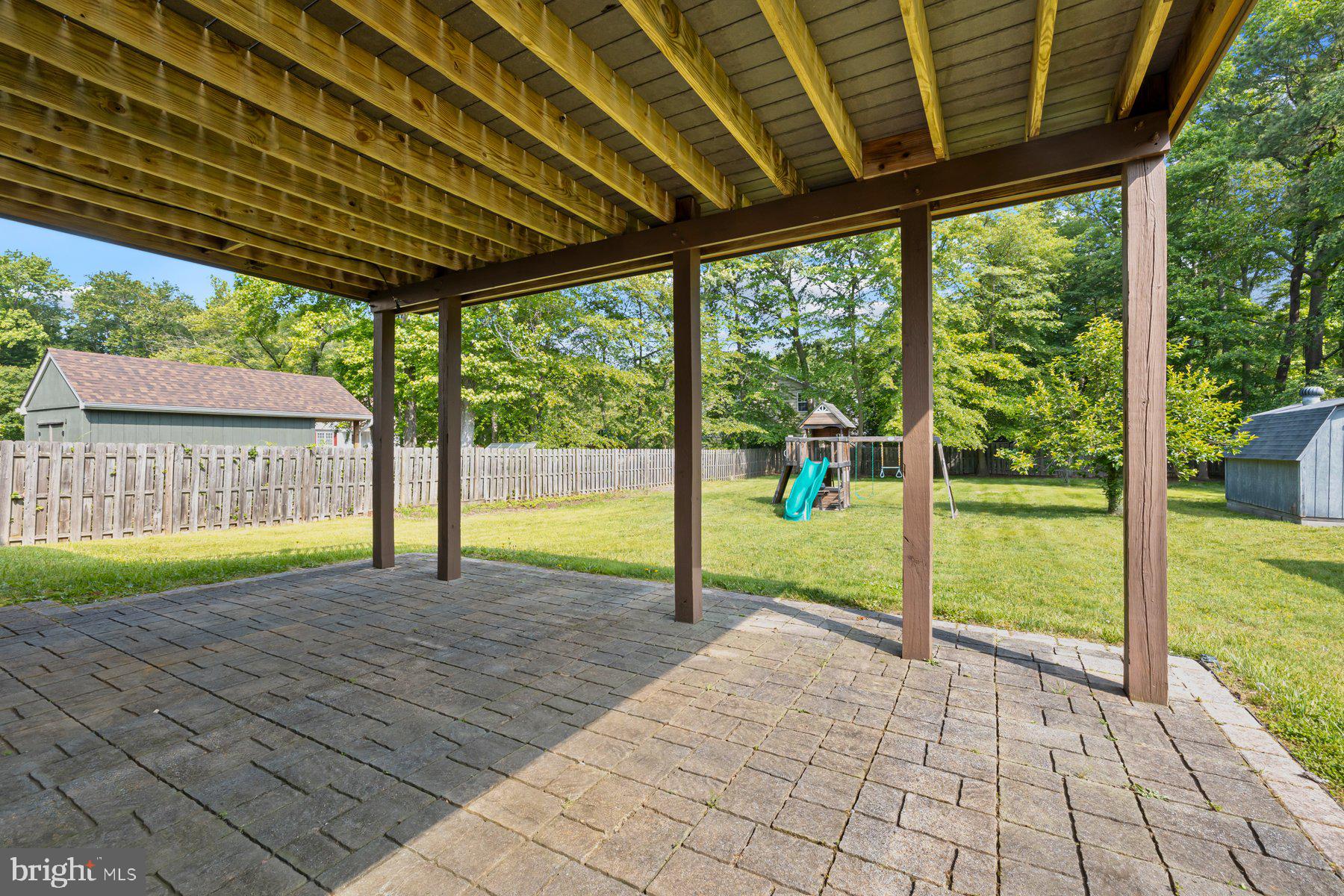 8304 Grainfield Road Severn, MD 21144 - Photo 34 of 49 a view of swimming pool with a backyard