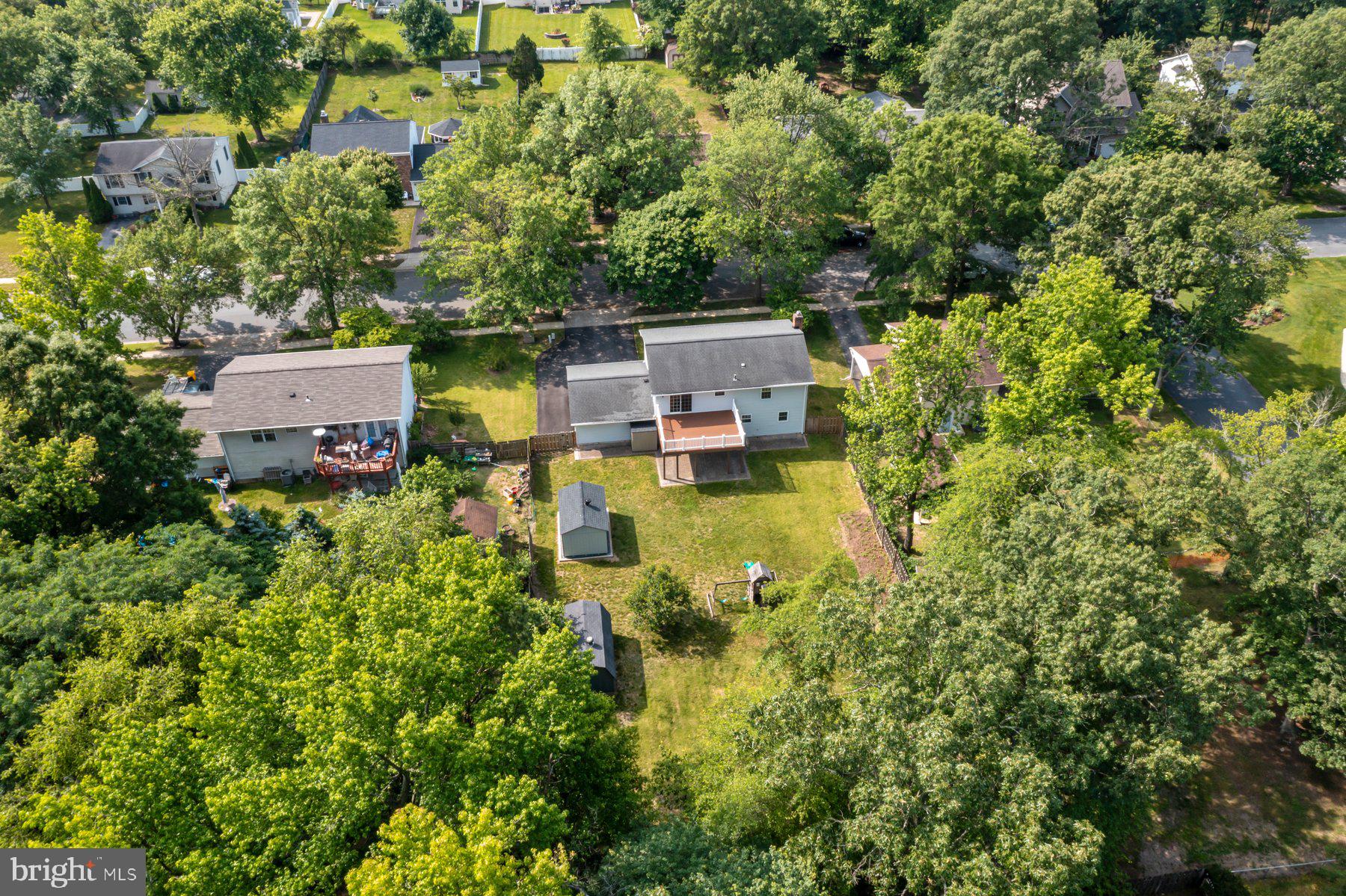 8304 Grainfield Road Severn, MD 21144 - Photo 39 of 49 an aerial view of a house with a yard