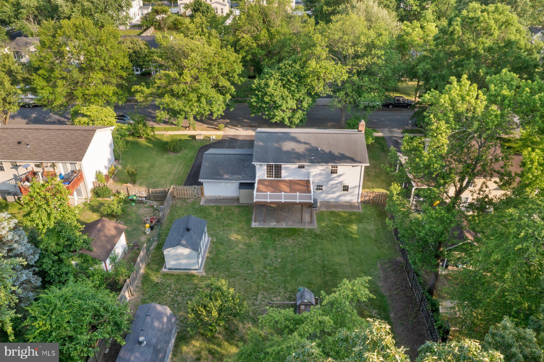 8304 Grainfield Road Severn, MD 21144 - Photo 42 of 49 an aerial view of a house with a yard