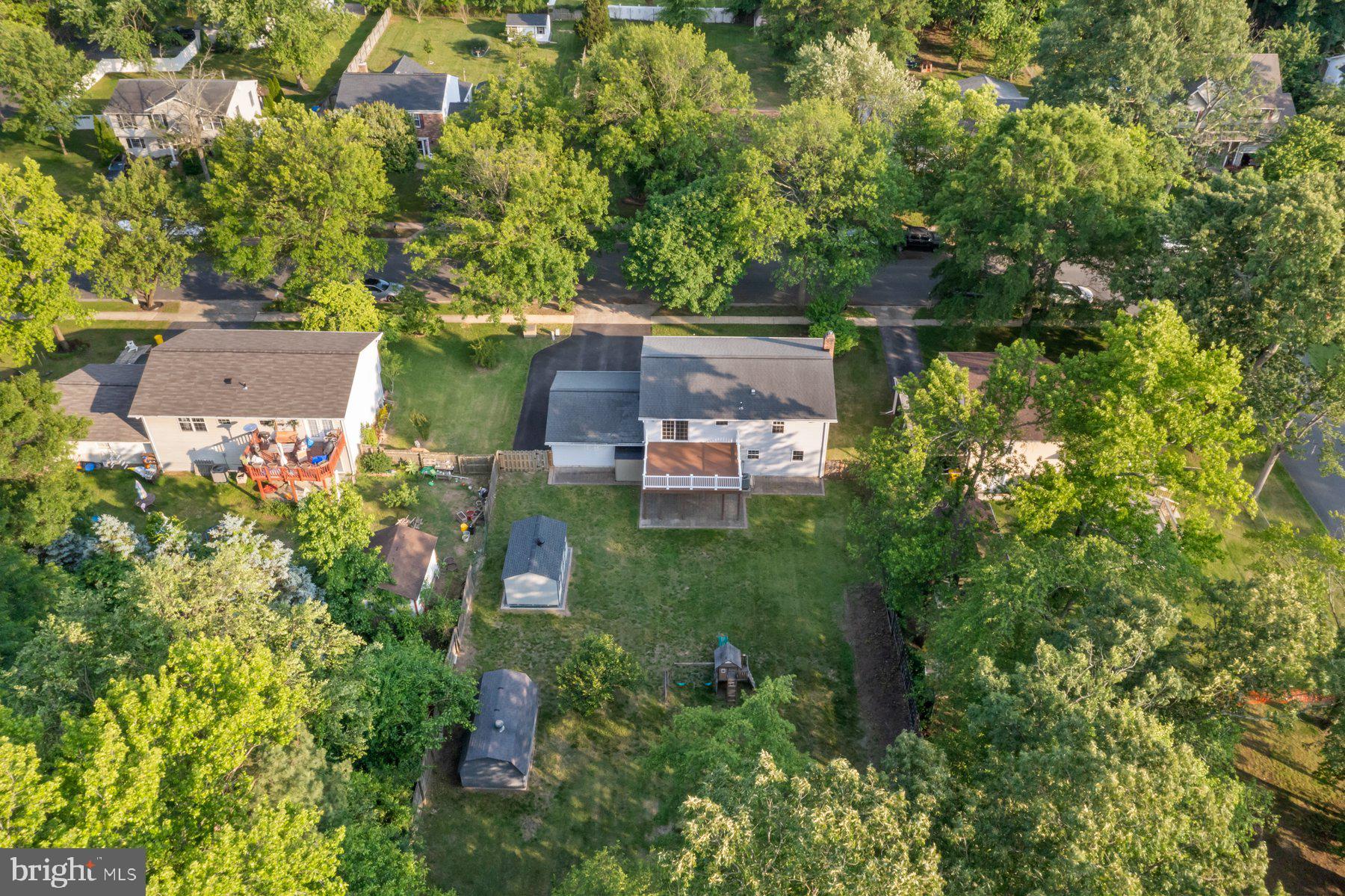 8304 Grainfield Road Severn, MD 21144 - Photo 43 of 49 an aerial view of a house with a yard