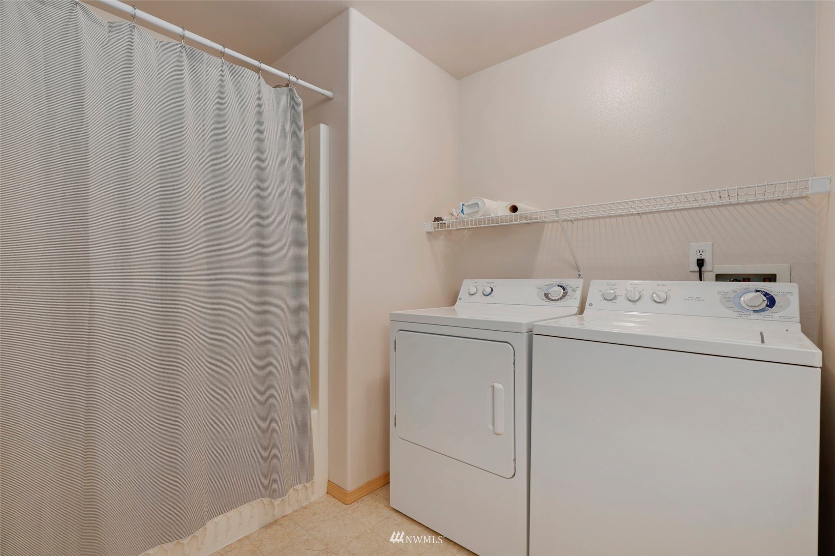 1322 196th Place Southeast Bothell, WA 98012 - Photo 25 of 40 a utility room with dryer and washer
