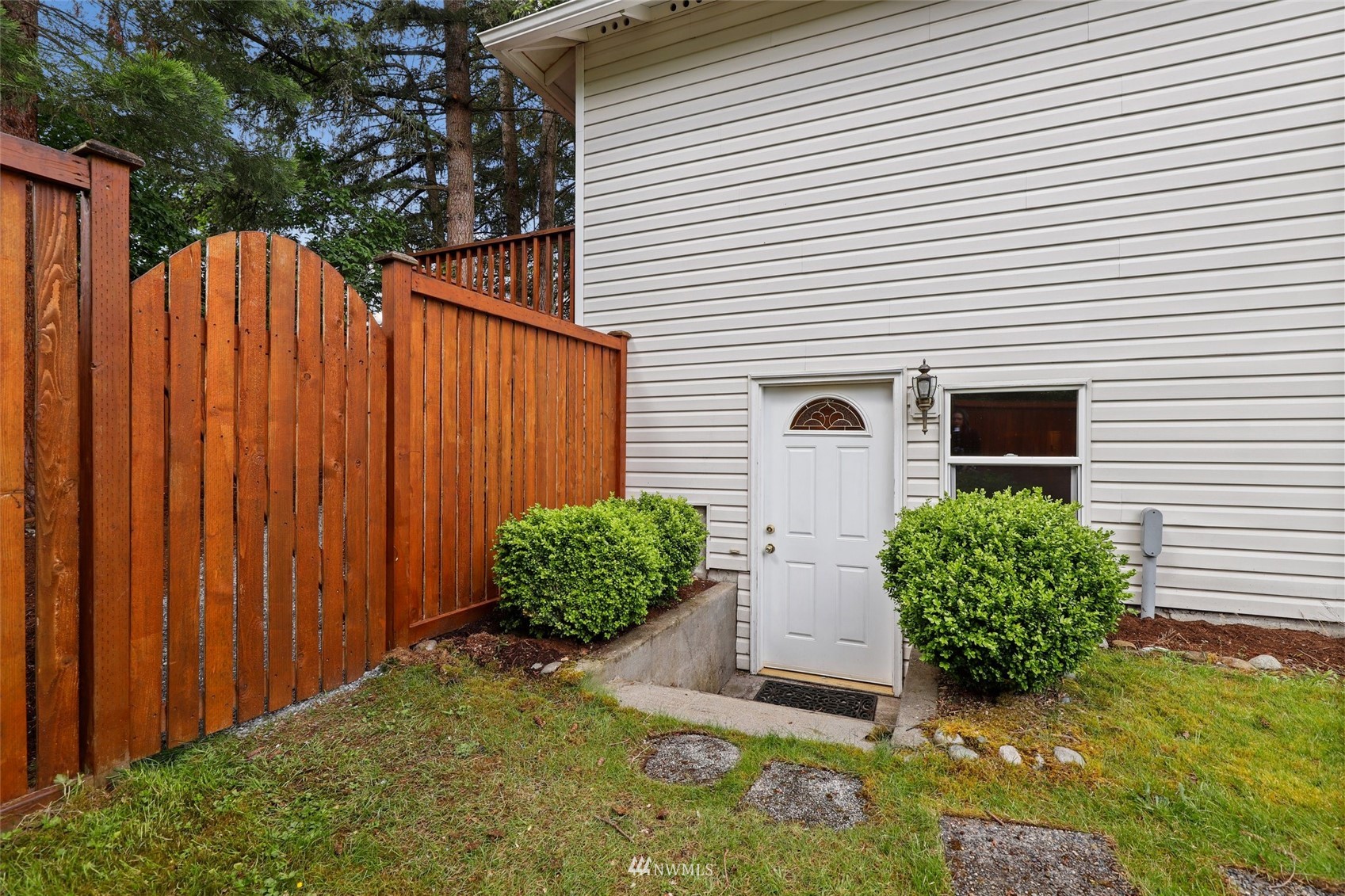 1322 196th Place Southeast Bothell, WA 98012 - Photo 32 of 40 a front view of a house with garden
