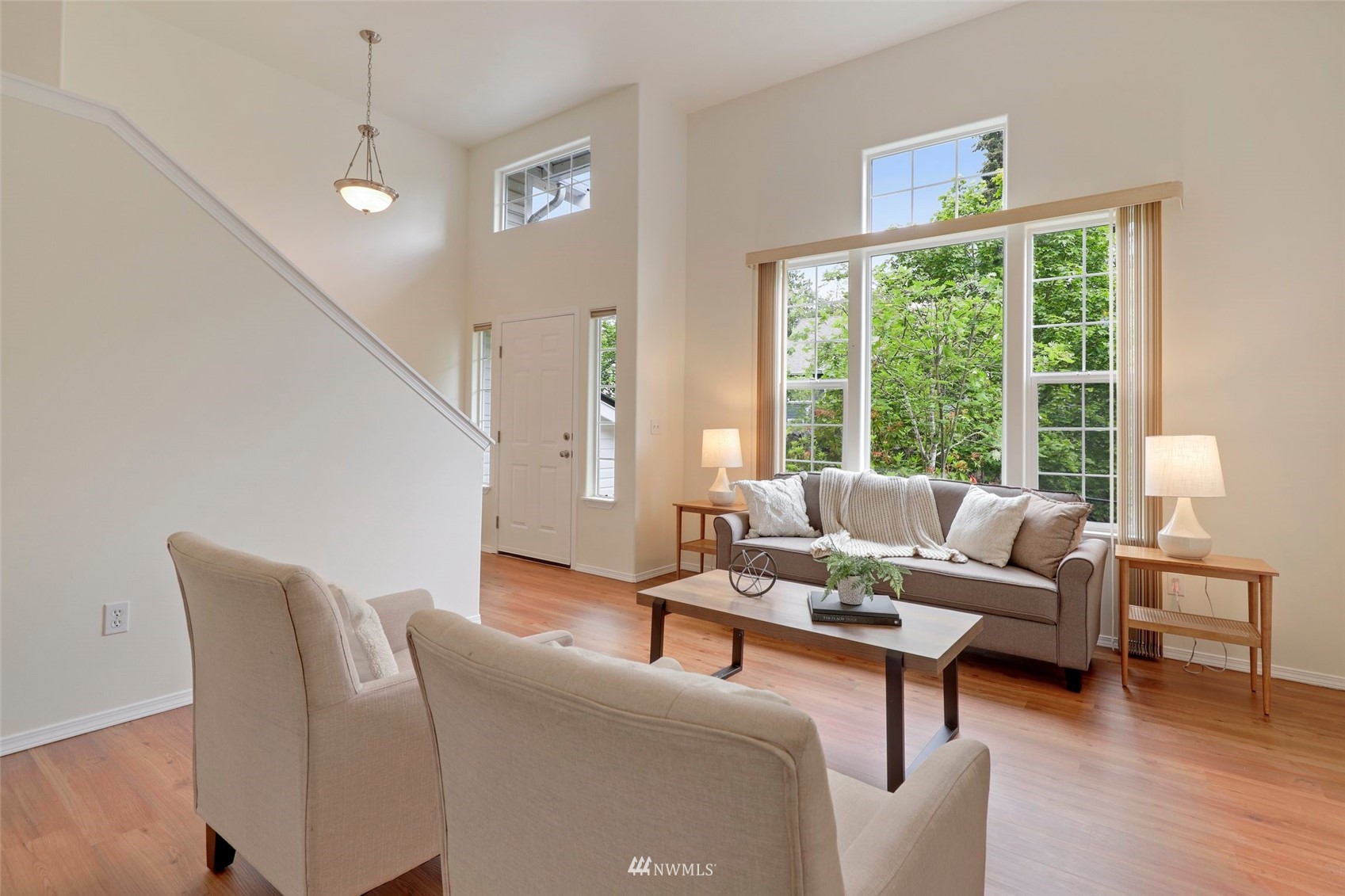 1322 196th Place Southeast Bothell, WA 98012 - Photo 4 of 40 a living room with furniture and a large window