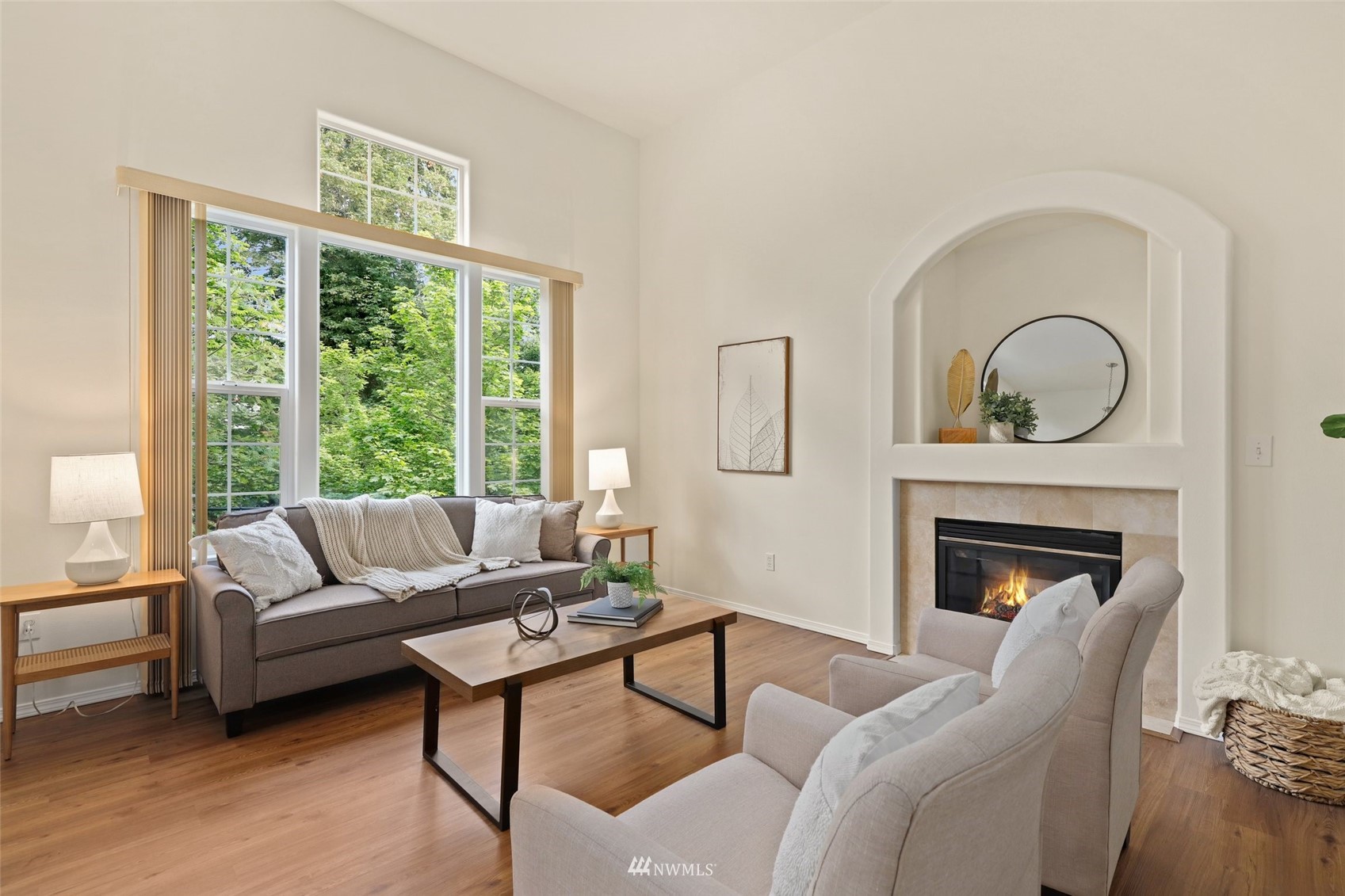 1322 196th Place Southeast Bothell, WA 98012 - Photo 5 of 40 a living room with furniture and a fireplace