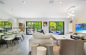 635 Curtiswood Drive Key Biscayne, FL 33149 - Photo 6 of 22 a living room with furniture and a large window