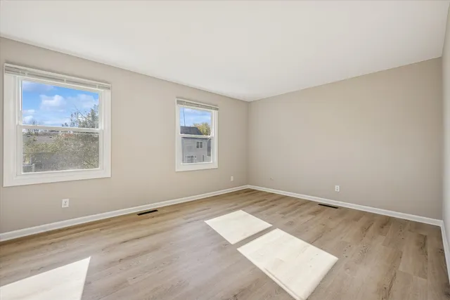 an empty room with windows