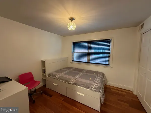 a room with furniture and a window