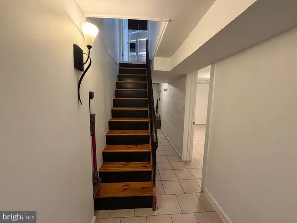 a view of entryway with stairs