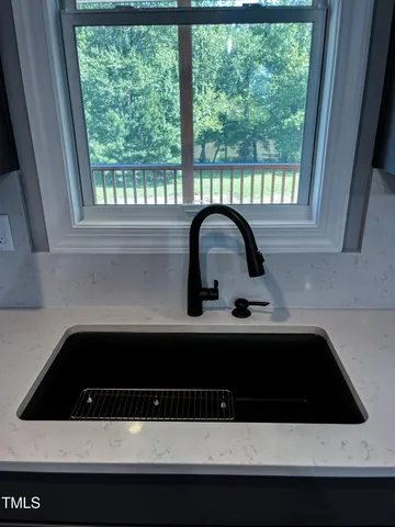 a view of cabinets with wooden floor