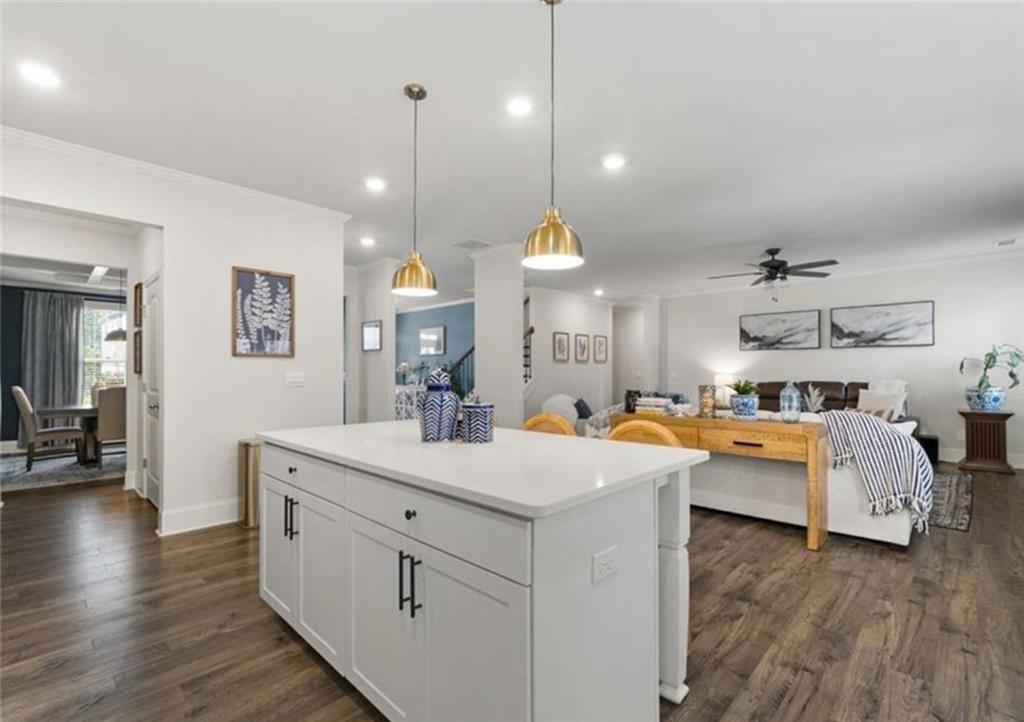 146 Citrine Way Acworth, GA 30101 - Photo 15 of 48 a view of a kitchen with cabinets and wooden floor