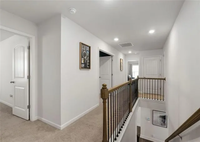 a view of a hallway with entryway