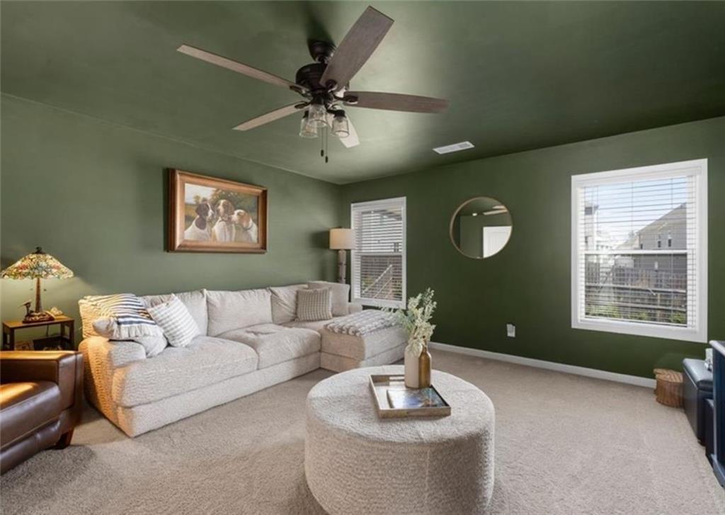 146 Citrine Way Acworth, GA 30101 - Photo 29 of 48 a living room with furniture and a large window