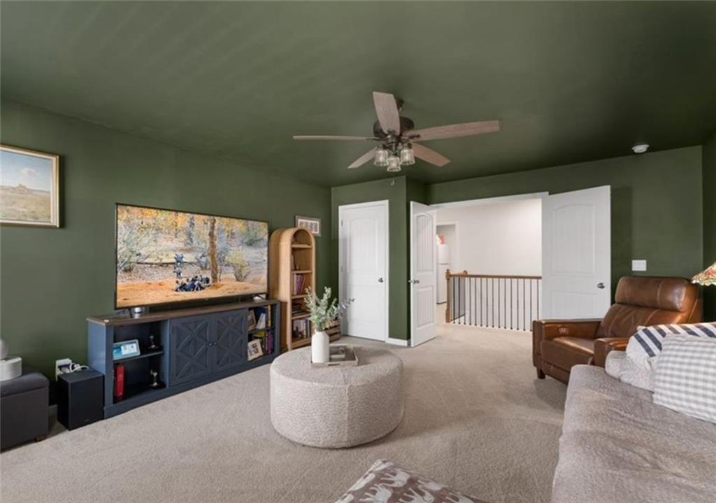 146 Citrine Way Acworth, GA 30101 - Photo 30 of 48 a living room with furniture and a large window