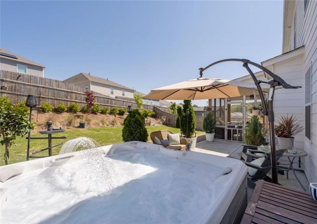 146 Citrine Way Acworth, GA 30101 - Photo 46 of 48 a view of a swimming pool with a patio