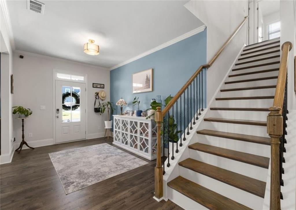 146 Citrine Way Acworth, GA 30101 - Photo 8 of 48 a view of entryway and hall with wooden floor