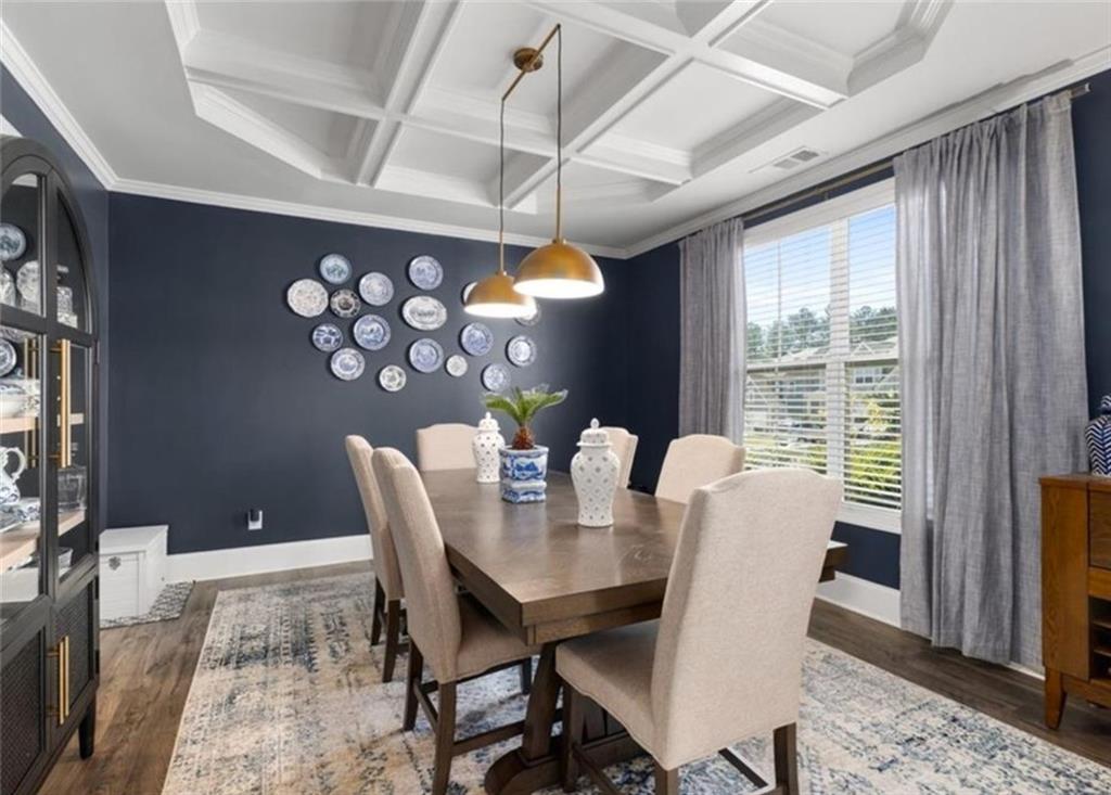 146 Citrine Way Acworth, GA 30101 - Photo 9 of 48 a view of a dining room with furniture window and wooden floor