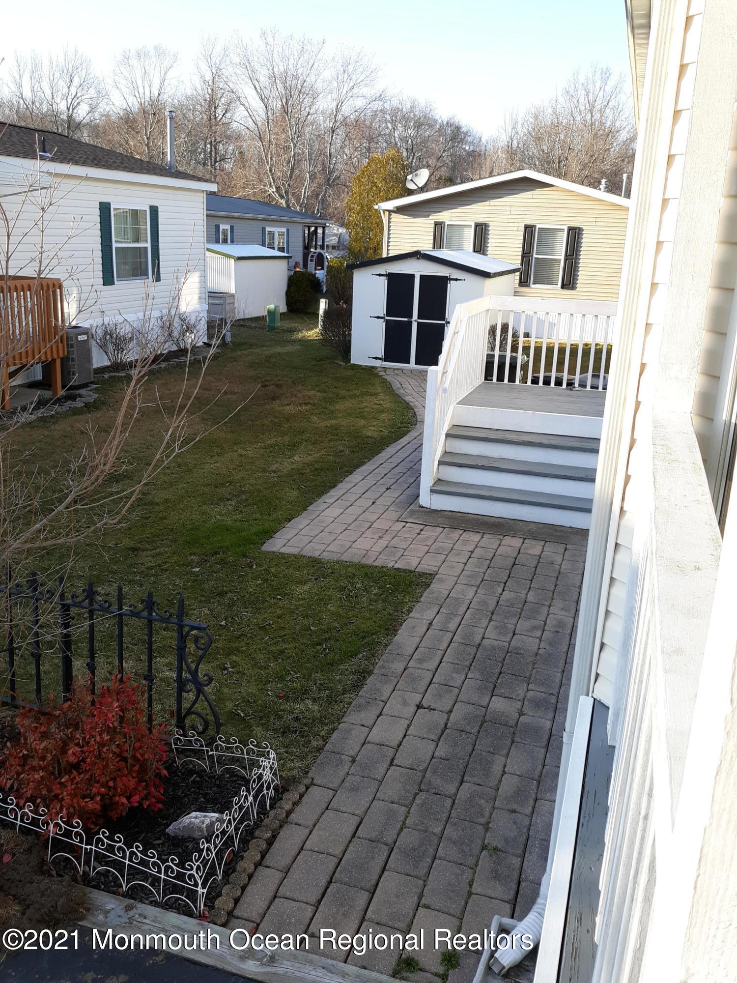 27 Village Road Morganville, NJ 07751 - Photo 3 of 17 27 village side entrance