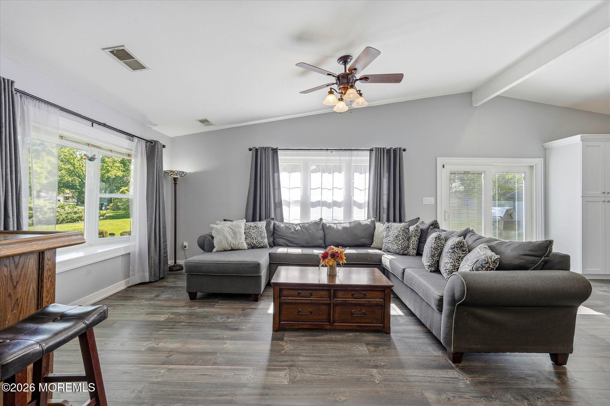 22 Ethan Allen Road Freehold, NJ 07728 - Photo 8 of 31 a living room with furniture and a large window