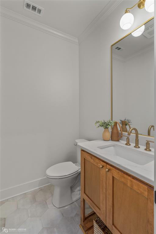 75 Turtle Creek Drive Benton, LA 71006 - Photo 27 of 32 a bathroom with a granite countertop sink toilet and mirror