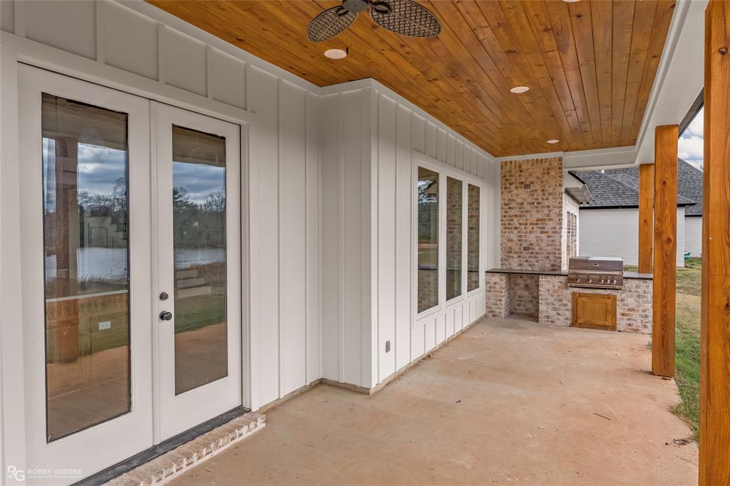 75 Turtle Creek Drive Benton, LA 71006 - Photo 28 of 32 a view of a hallway with outdoor seating