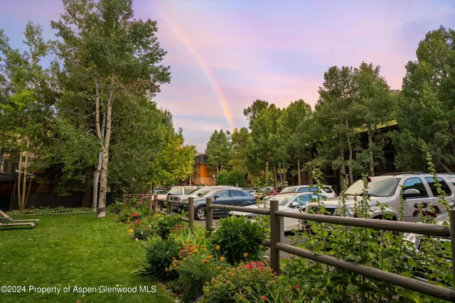 a view of a garden with a patio