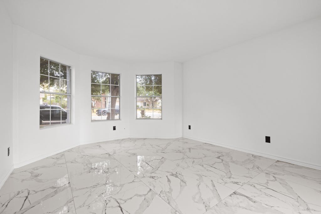 915 Satellite View Round Rock, TX 78665 - Photo 3 of 36 a view of an empty room with a window