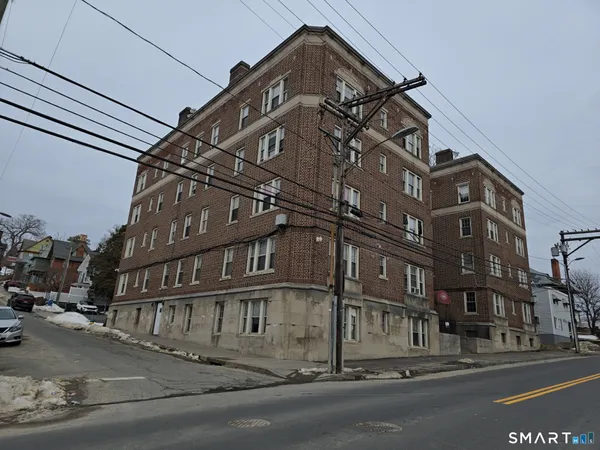 a view of a building with a street