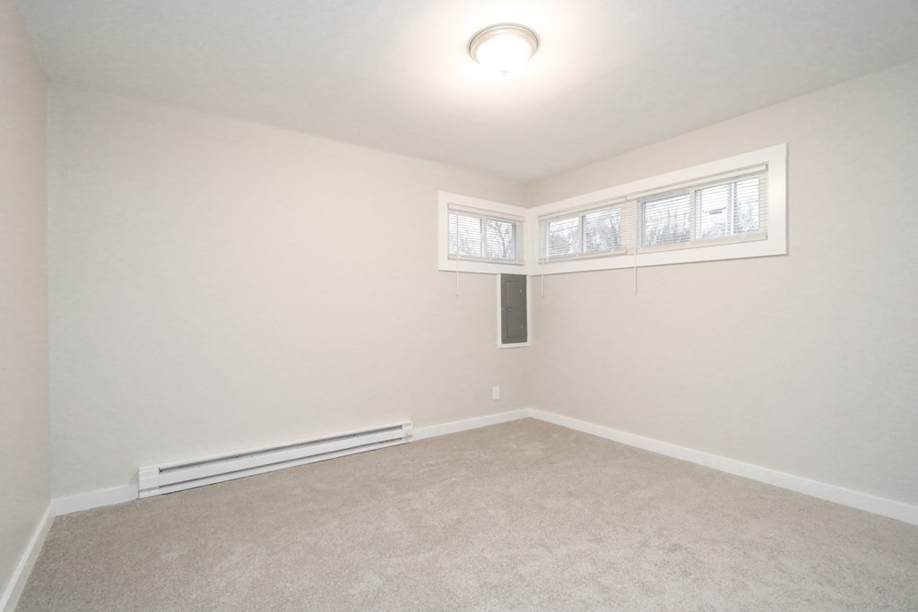 40 Vincent Street Springfield, MA 01129 - Photo 14 of 35 an empty room with a empty space and window