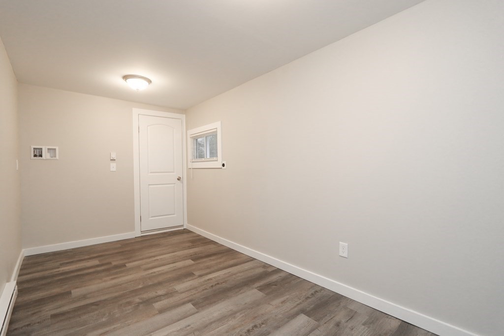40 Vincent Street Springfield, MA 01129 - Photo 24 of 35 a view of room with wooden floor