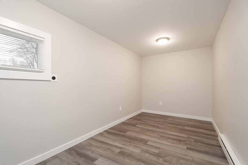 40 Vincent Street Springfield, MA 01129 - Photo 27 of 35 wooden floor in an empty room