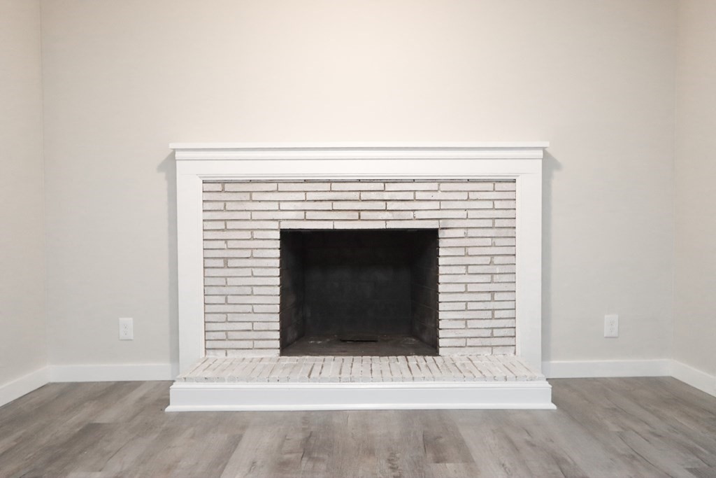 40 Vincent Street Springfield, MA 01129 - Photo 5 of 35 a view of fireplace and wooden floor