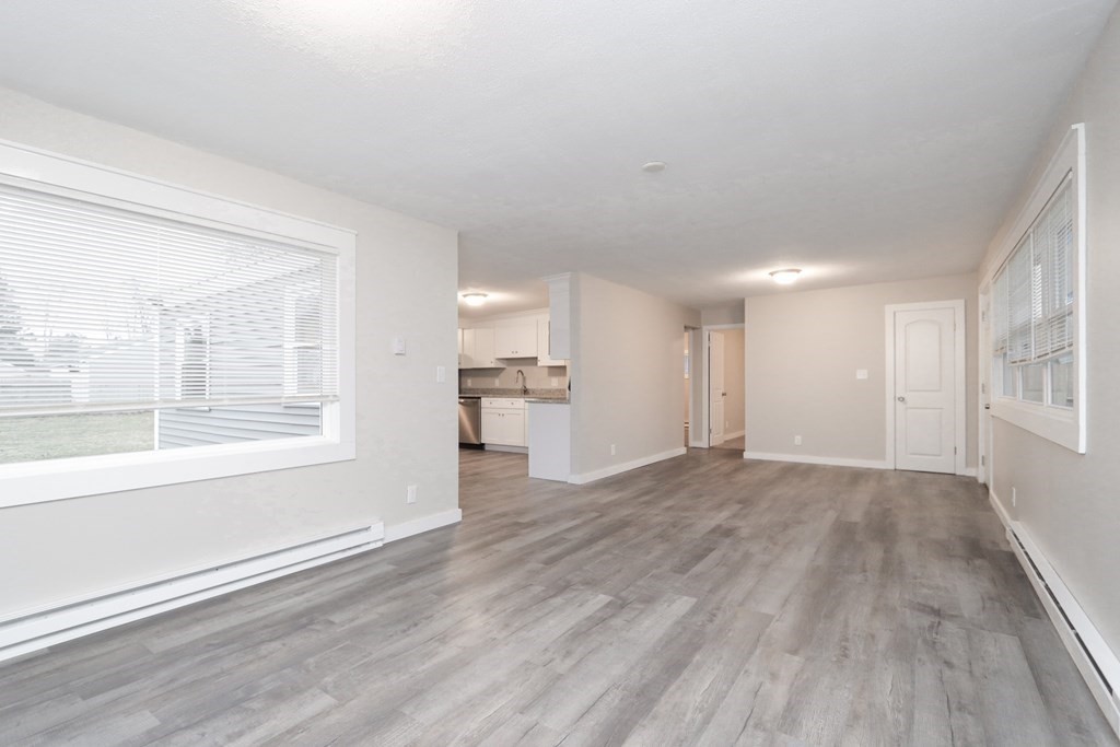 40 Vincent Street Springfield, MA 01129 - Photo 7 of 35 wooden floor in an empty room with a window