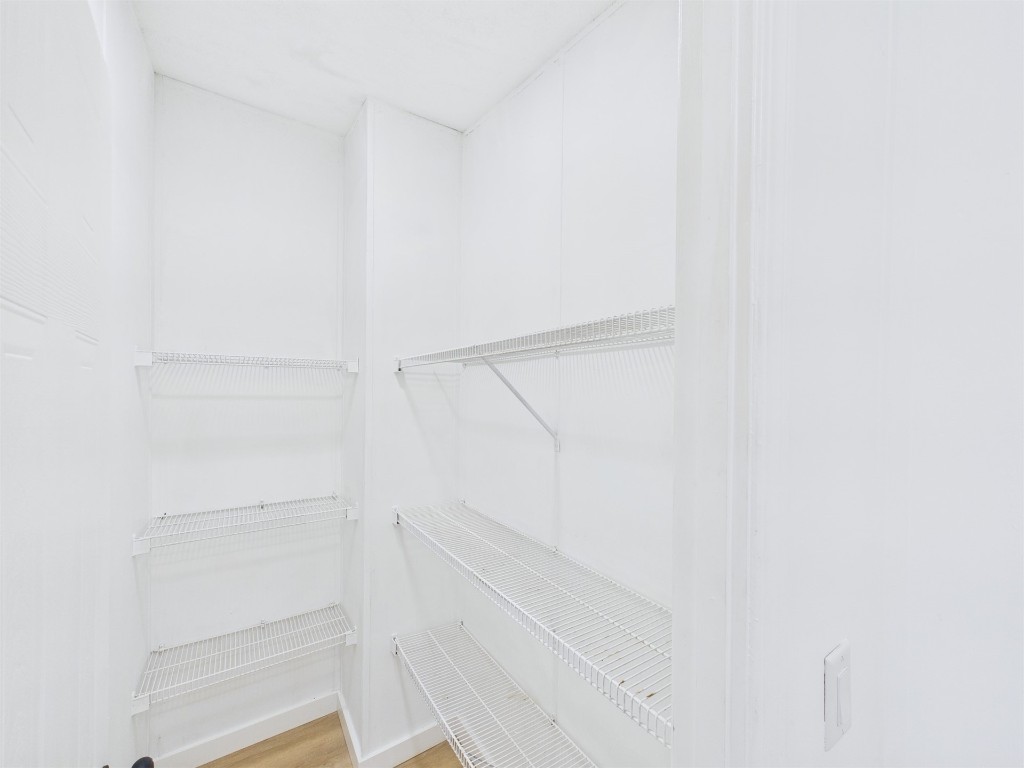 85490 Alene Road Yulee, FL 32097 - Photo 18 of 49 a view of walk in closet with empty racks